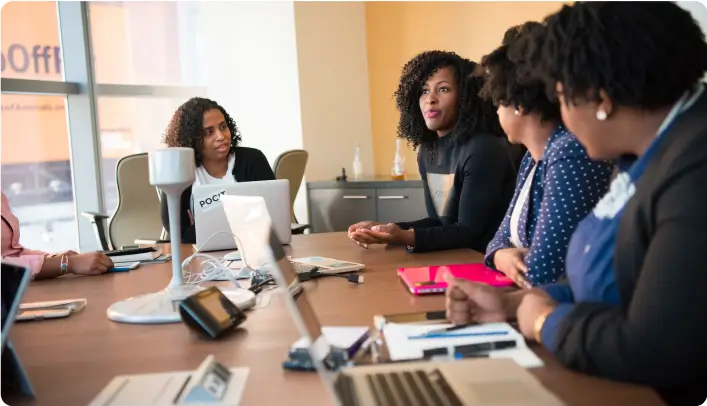 Group of people in an office meeting